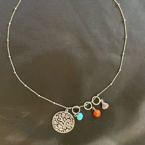 Silpada necklace with pendant and three charms. 18”